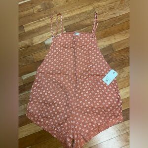 Billabong printed romper. New with tags. Size XL